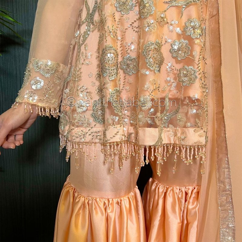 Peach Heavily Beaded Peplum Garara Suit