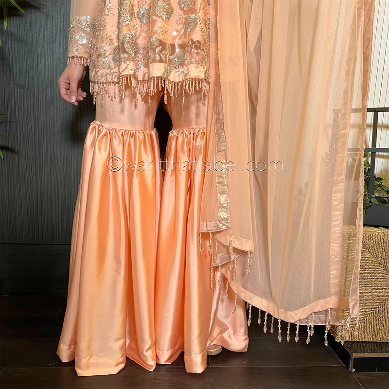 Peach Heavily Beaded Peplum Garara Suit
